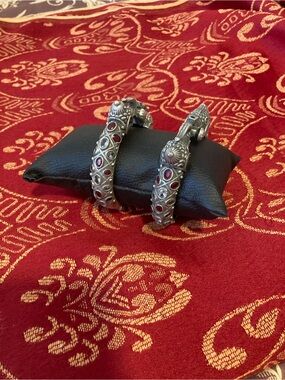 Sterling-Style Silver Hinged Bracelet with Red Gem Accents